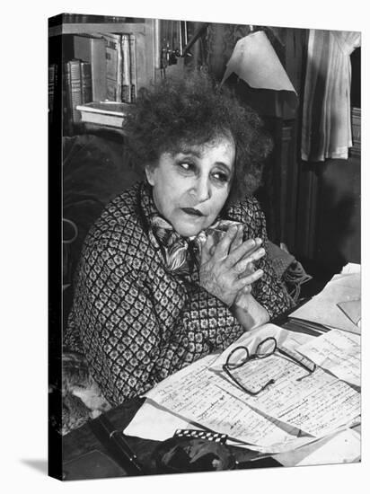 French Novelist Colette, at Desk Covered with Handwritten Notes Topped by Reading Glasses at Home-David Scherman-Premier Image Canvas