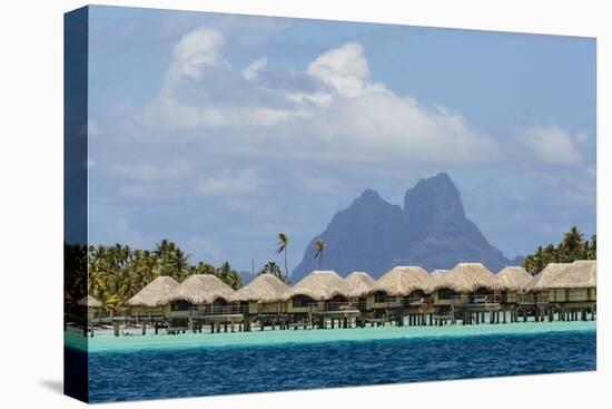 French Polynesia, Society Islands, Motu Tautau. Stilted Hotel Suites-Alida Latham-Premier Image Canvas