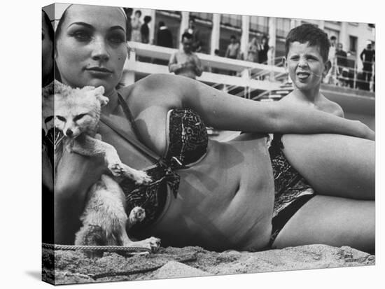 French Starlet Philomene Toulouse Angling Attention with Pet Fox and Bare Torso-Paul Schutzer-Premier Image Canvas