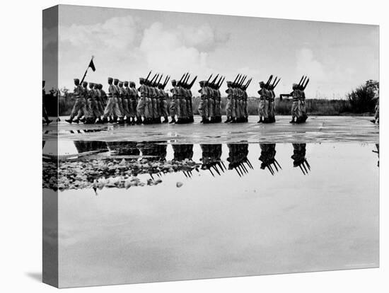 French Troops, Evacuating Hanoi, Mirrored in a Puddle as They Pass in Final Dress Review-Howard Sochurek-Premier Image Canvas