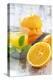 Fresh Pressed Orange Juice and Oranges-Jana Ihle-Premier Image Canvas