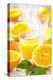Fresh Pressed Orange Juice and Oranges-Jana Ihle-Premier Image Canvas
