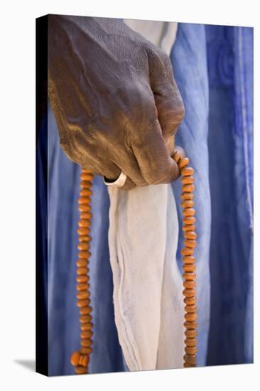 Gambian Holding Misbaha or Worry Beads-Jon Hicks-Premier Image Canvas