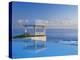 Gazebo Reflecting on Pool with Sea in Background, Long Island, Bahamas-Kent Foster-Premier Image Canvas