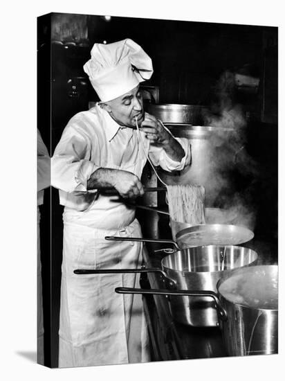 Gene Leone, Taking a Bite Test to Determine Whether the Bo Ling Spaghetti is Properly Firm-Eliot Elisofon-Premier Image Canvas