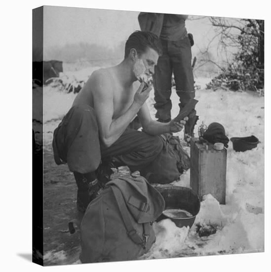 GI shaving with mirror during ull in the Ardennes Forest Conflict called the Battle of the Bulge-John Florea-Premier Image Canvas