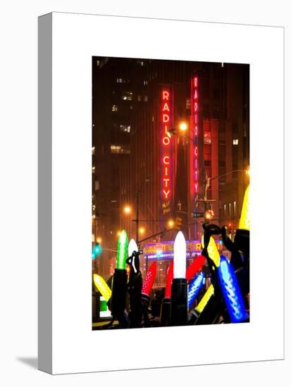 Giant Christmas wreath in front of the Radio City Music Hall on a Winter Night-Philippe Hugonnard-Stretched Canvas