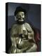 Gilt statue of Marco Polo holding a pomegranate, symbol of wealth and prosperity-Werner Forman-Premier Image Canvas