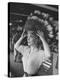 Gina Lollobrigida Trying on Native American Head Piece-Peter Stackpole-Premier Image Canvas