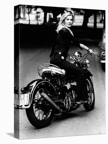 Giovanna Rides a High-powered Motorbike-null-Premier Image Canvas