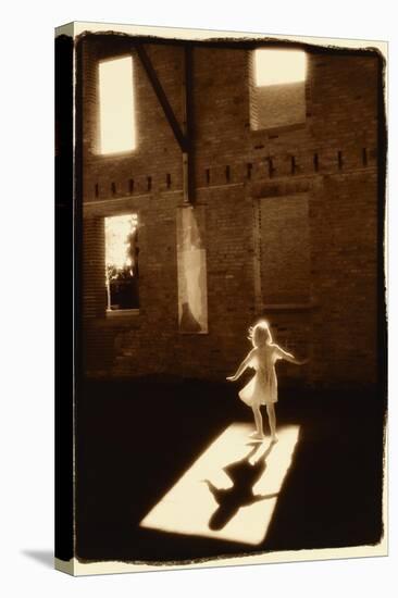 Girl dancing in a shaft of light-Theo Westenberger-Stretched Canvas