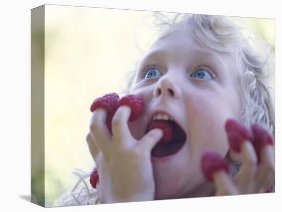 Girl Eating Raspberries, Bellingham, Washington, USA-Steve Satushek-Premier Image Canvas