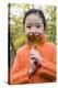 Girl Holding An Autumn Leaf-Ian Boddy-Premier Image Canvas