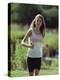 Girl Jogging with Headphones-null-Premier Image Canvas