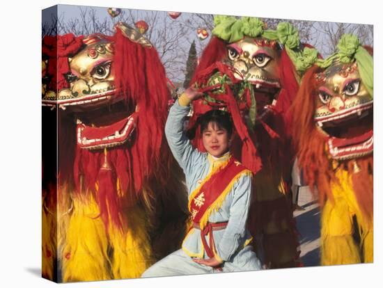 Girl Playing Lion Dance for Chinese New Year, Beijing, China-Keren Su-Premier Image Canvas