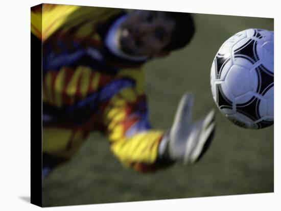 Goalie Attempting to Stop a Soccer Ball-null-Premier Image Canvas