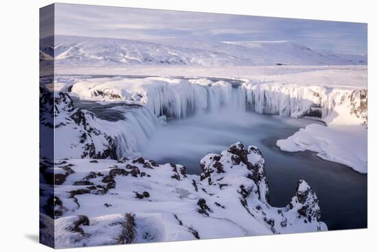 Godafoss waterfall frozen during winter, Iceland-Ross Hoddinott-Premier Image Canvas