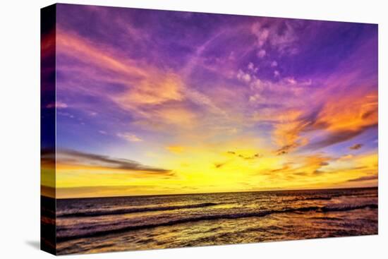 Golden light of the setting sun reflects a gold glow on the beach at Pererenan Beach, Bali.-Greg Johnston-Premier Image Canvas