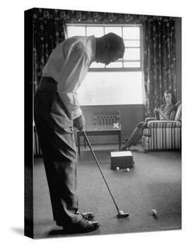 Golfer Ben Hogan Practicing Putting in His town house with Wife Valerie Watching from Armchair-Loomis Dean-Premier Image Canvas