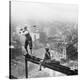 Golfer Teeing off on Girder High above City-null-Premier Image Canvas