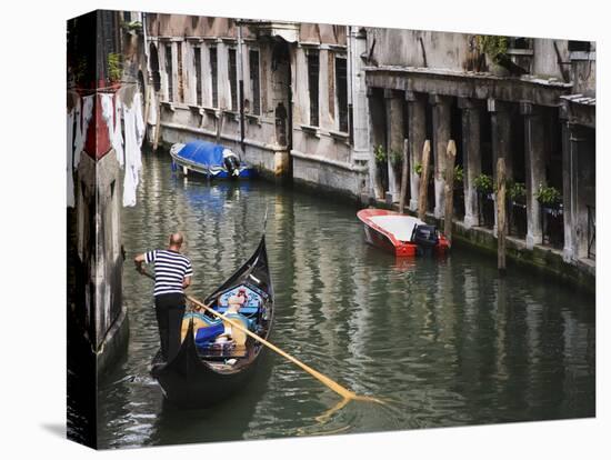 Gondola with Passengers on a Canal, Venice, Italy-Dennis Flaherty-Premier Image Canvas