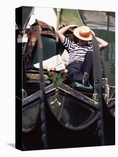 Gondolier Relaxing in Gondola, Venice, Veneto, Italy-Adam Woolfitt-Premier Image Canvas