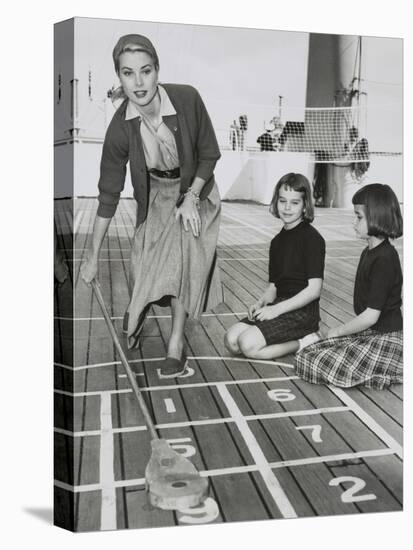 Grace Kelly by Playing Shuffleboard on the Deck of the Uss Constitution, April 10, 1956-null-Stretched Canvas