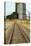 Grain Silos And Railway Track-Tony Craddock-Premier Image Canvas