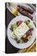 Greece, Peloponnese, Corinth, Greek Salad with Souvlaki and Fries-Walter Bibikow-Premier Image Canvas