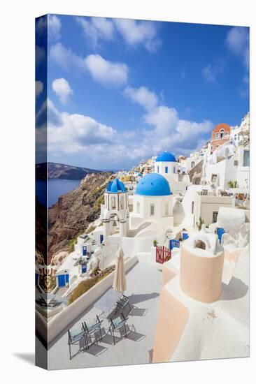 Greek Church with Three Blue Domes in the Village of Oia-Neale Clark-Premier Image Canvas