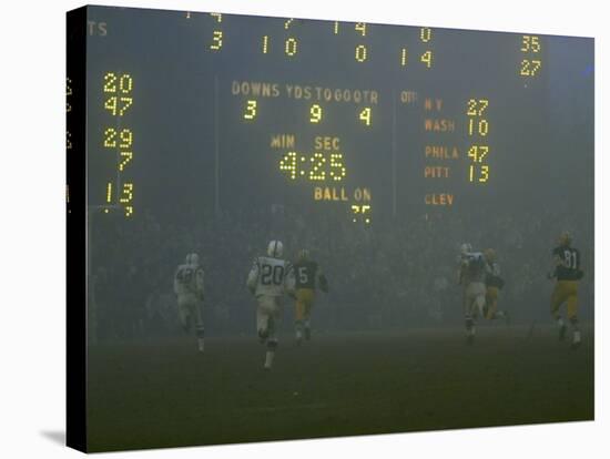 Green Bay Packers' Hornung Eluding Baltimore Colt's Defense to Score 5th Touchdown of Game, 1965-Art Rickerby-Premier Image Canvas