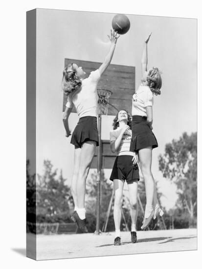 Group of Young Woman Playing Basketball-null-Stretched Canvas