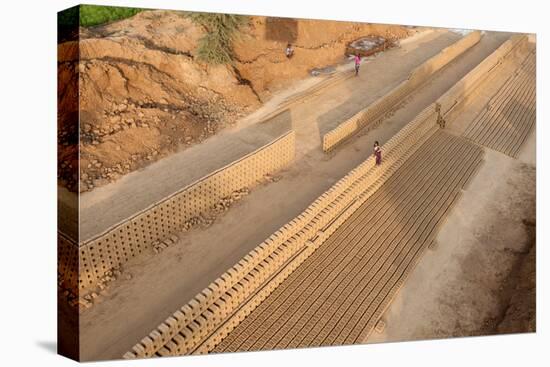 Hand Made Bricks Laid Out on the Ground to Dry before Baking, Northeast of Jaipur, Rajasthan, India-Annie Owen-Premier Image Canvas