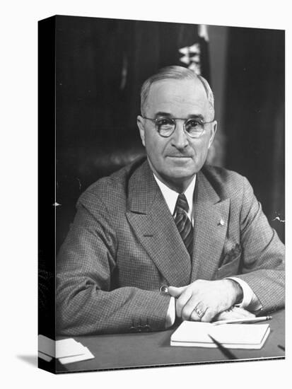 Harry S. Truman Sitting at Desk-Marie Hansen-Premier Image Canvas