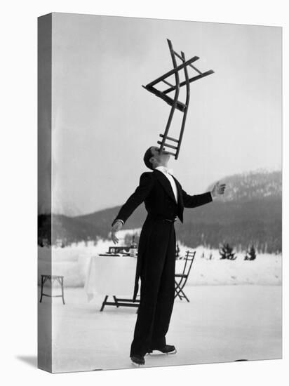 Head Waiter Rene Breguet Balancing Chair on Chin at Ice Rink of Grand Hotel-Alfred Eisenstaedt-Premier Image Canvas