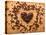 Heart Shape From Brown Coffee Beans, Close-Up On Old Vintage Wooden Background-ouh_desire-Stretched Canvas