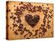 Heart Shape From Brown Coffee Beans, Close-Up On Old Vintage Wooden Background-ouh_desire-Stretched Canvas