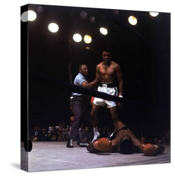 Heavyweight Boxer Cassius Clay, aka Muhammad Ali, Standing over Opponent Sonny Liston-George Silk-Premier Image Canvas