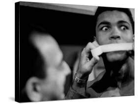 Heavyweight Contender Cassius Clay, Getting His Mouth Taped by Trainer Angelo Dundee-George Silk-Premier Image Canvas