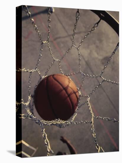 High Angle View of a Basketball in a Net-null-Premier Image Canvas