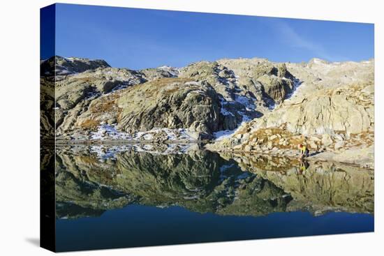 Hiker at Lac Blanc, Chamonix, Haute-Savoie, French Alps, France, Europe-Christian Kober-Premier Image Canvas