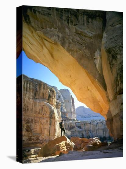 Hiker Below Natural Navajo Sandstone Hickman Bridge, Capitol Reef National Park, Utah, Usa-Scott T^ Smith-Premier Image Canvas