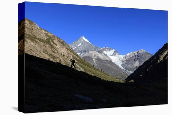 Hiker Climbs the Ridge and in the Background the Weisshorn-Roberto Moiola-Premier Image Canvas