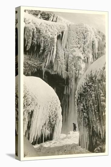 Hiker in Frozen Waterfall-null-Stretched Canvas