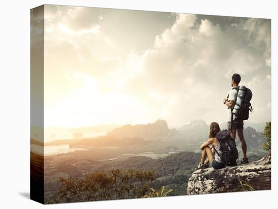 Hikers With Backpacks Enjoying Valley View From Top Of A Mountain-Dudarev Mikhail-Stretched Canvas