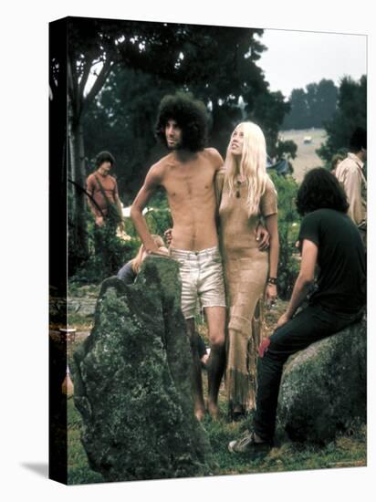 Hippie Couple Posed Together Arm in Arm with Others Around Them, During Woodstock Music/Art Fair-John Dominis-Premier Image Canvas