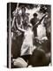 Hippie Girl Enthusiastically Playing Flute and Dancing at Woodstock Music Festival-null-Premier Image Canvas