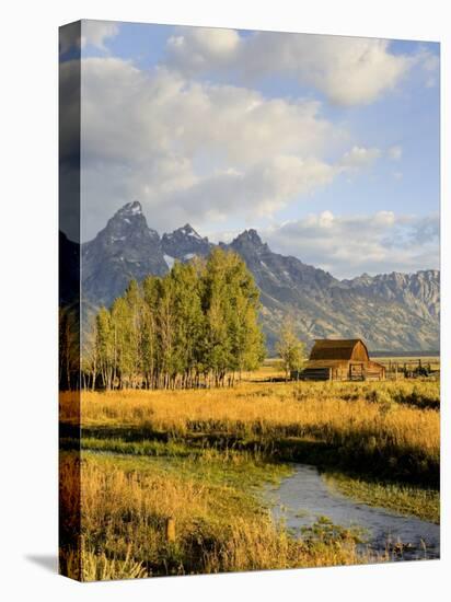 Historic Barn, Mormon Row and Teton Mountain Range, Grand Teton National Park, Wyoming, USA-Michele Falzone-Premier Image Canvas