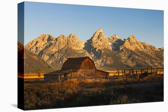 Historical Moulton barn at sunrise, Grand Teton National Park.-Adam Jones-Premier Image Canvas