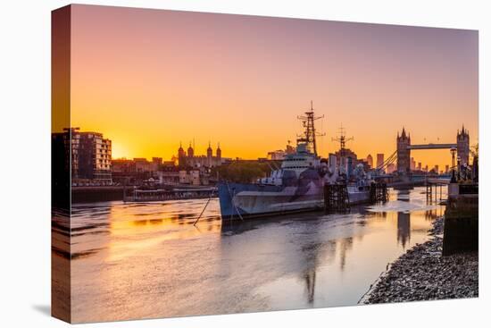 HMS Belfast and Tower Bridge at sunrise with a low tide on the River Thames, London-Ed Hasler-Premier Image Canvas